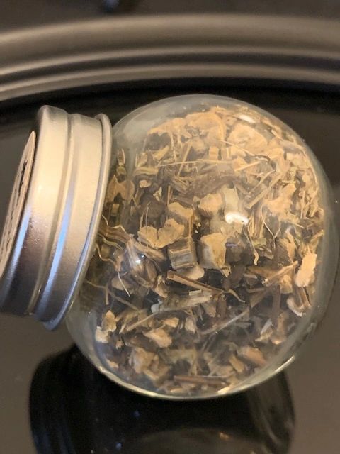 Echinacea in glass herb bottle