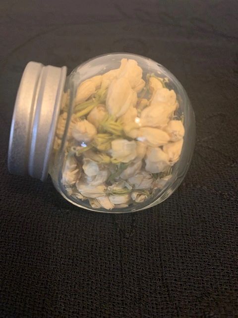 JASMINE FLOWERS IN GLASS HERB JAR